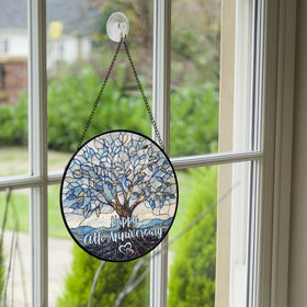 RosaTeeStore blue-gold glow enhances afternoon light through the suncatcher.