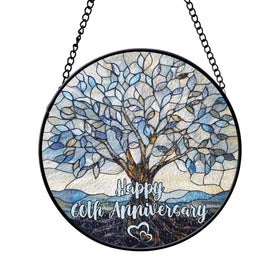 RosaTeeStore Tree of Life suncatcher for the 60th anniversary, enriches sunlight with calming blue tones.
