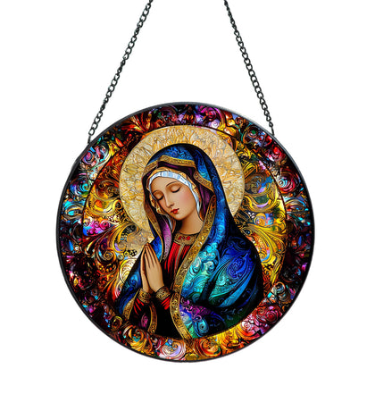 Rosporxin Mother Mary suncatcher glass panel adds vibrant color to sunny windows.