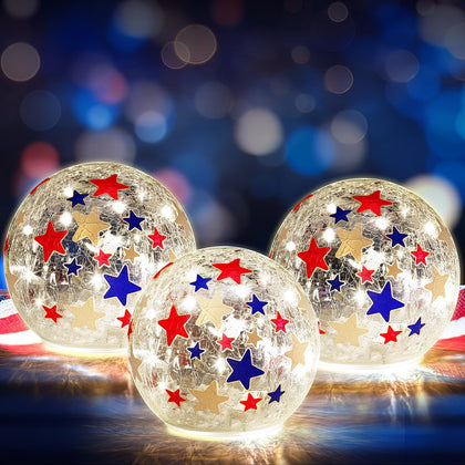 Rossesay crackle glass globe blue with star pattern emitting warm outdoor lighting