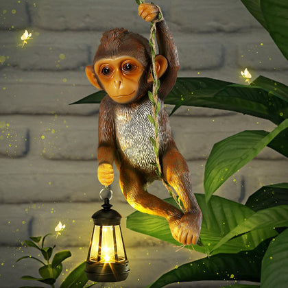 Rossesay monkey statue front view showcases playful outdoor charm for yards and gardens