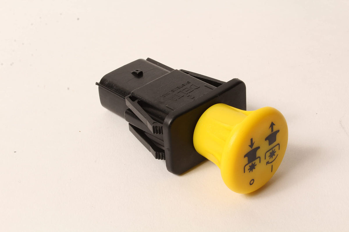 Rotary PTO switch yellow closeup for Scag mower controls