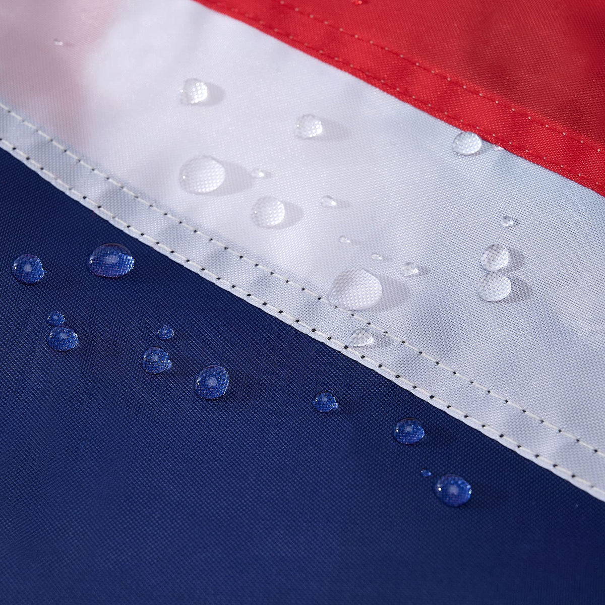 ROTERDON British flag 3x5 on porch, perfect for outdoor display.