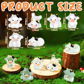 RoundFunny luminous cow figurine with detailed resin finish.