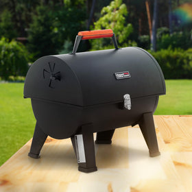 Royal Gourmet CC1619 portable grill side view, highlighting transportability for trips.