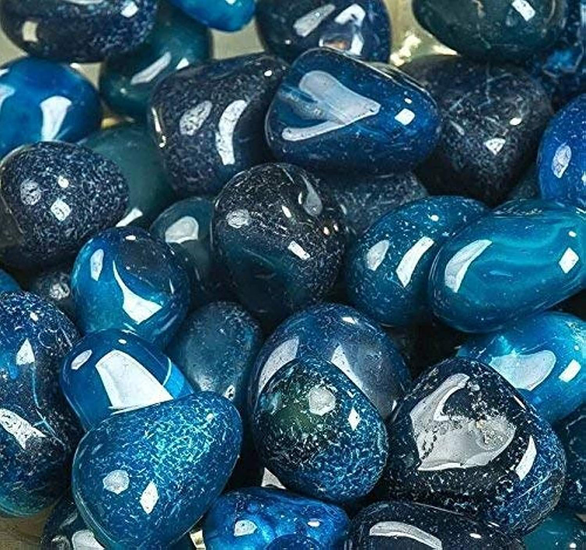 Royal Sapphire blue river rocks for aquariums, creating natural, rounded accents with safe, edge-free surfaces.