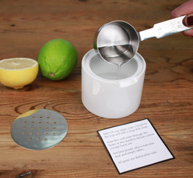 RSVP Endurance filled with apple cider vinegar to attract fruit flies.