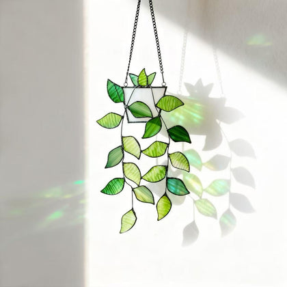 Rswardeleco stained glass leaf suncatcher in green window decor catching sunlight