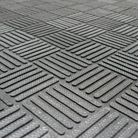 Rubber-Cal Dura-Scraper Checkered closeup shows durable reclaimed rubber material.