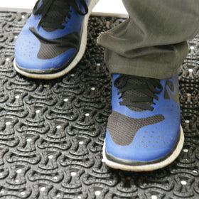 Rubber-Cal Dura-Scraper Drainage mat is easy to clean and maintain.