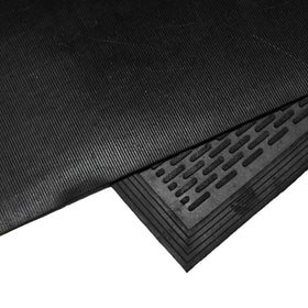 Rubber-Cal Dura-Scraper Linear 3x5 mat provides anti-slip protection in wet lobbies.
