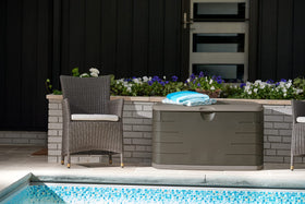 Outdoor setup using Rubbermaid deck box for organized yard essentials