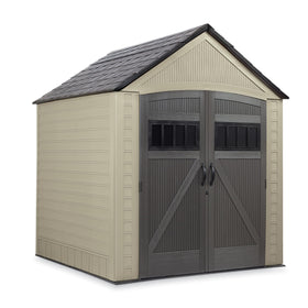 Rubbermaid resin outdoor shed with floor, 7x7, shows sturdy base for lawn equipment organization.