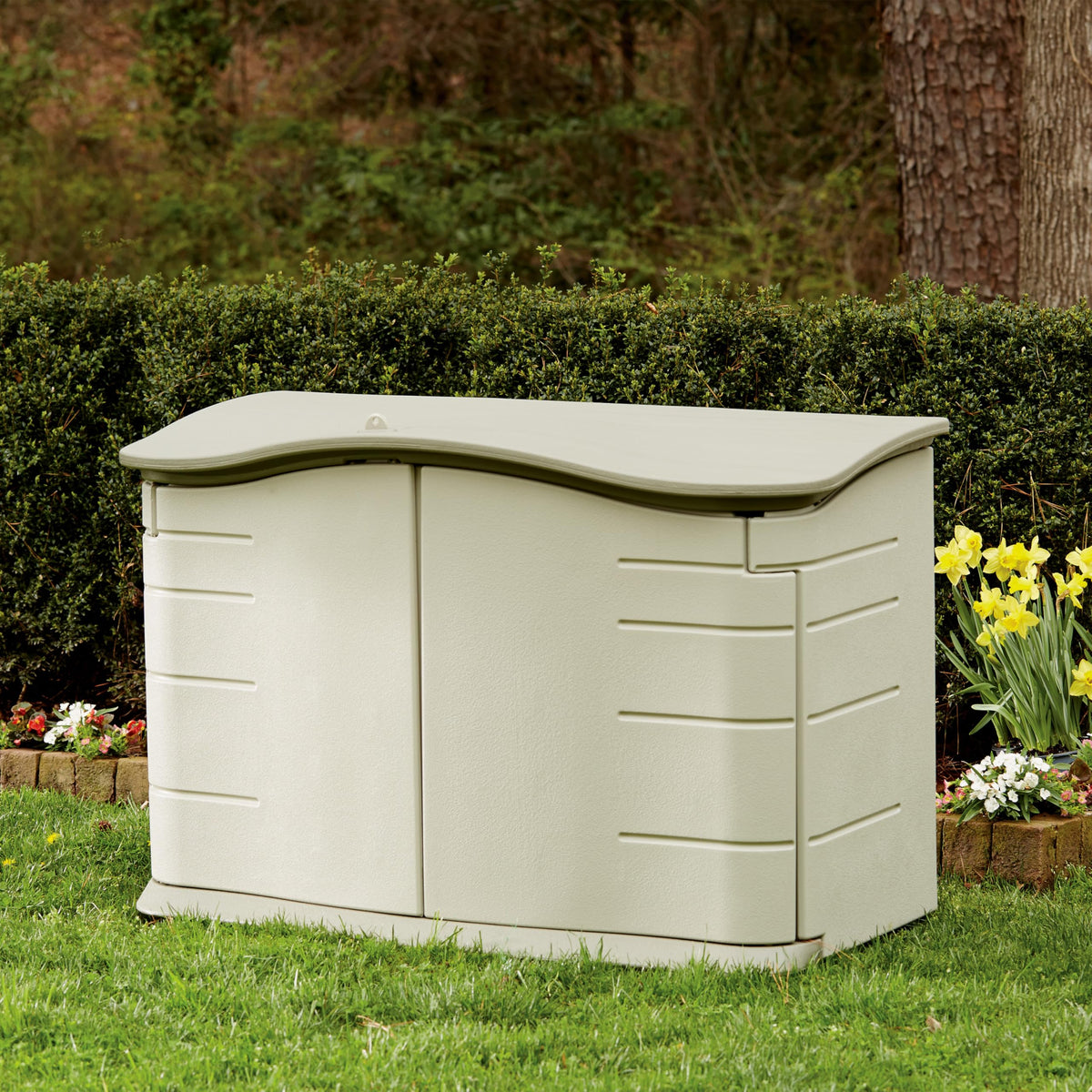 Rubbermaid small horizontal storage shed side door allows easy access to tools