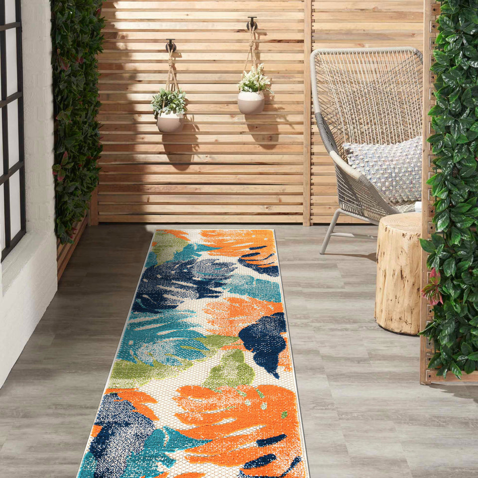 Rugshop Arles palm leaves runner rug brings tropical style to patios and entryways, durable and easy to clean.