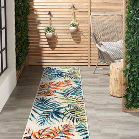 Rugshop Bahama Palm Frond floral pattern adds tropical flair to outdoor spaces.