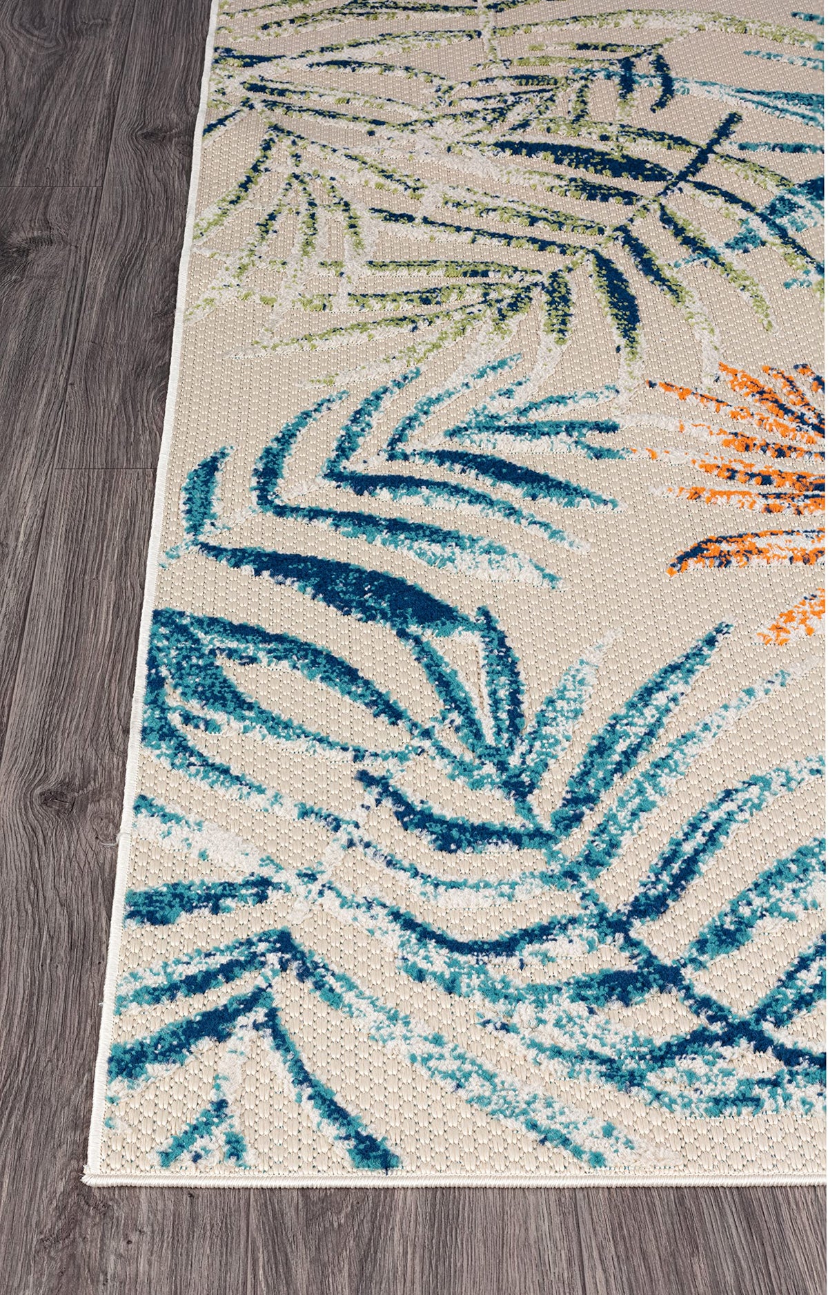 Rugshop Bahama Palm Frond stain-resistant rug helps keep entryways clean.