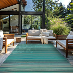 Rugshop blue outdoor rug in porch setting, versatile indoor/outdoor use