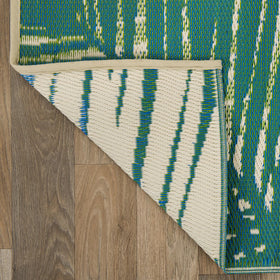 Rugshop easy-clean outdoor rug; hose rinse removes dirt quickly.