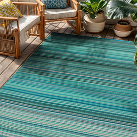 Rugshop lightweight outdoor rug that is portable for travel and adventures.