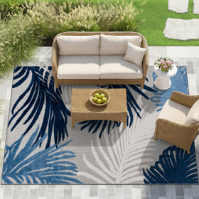 Rugshop Lucca navy rug on balcony with contemporary floral design.