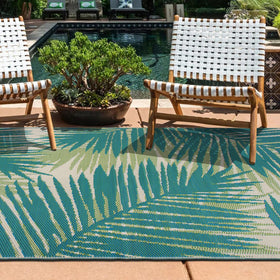Rugshop tropical palm pattern outdoor rug; adds visual flair to any area.