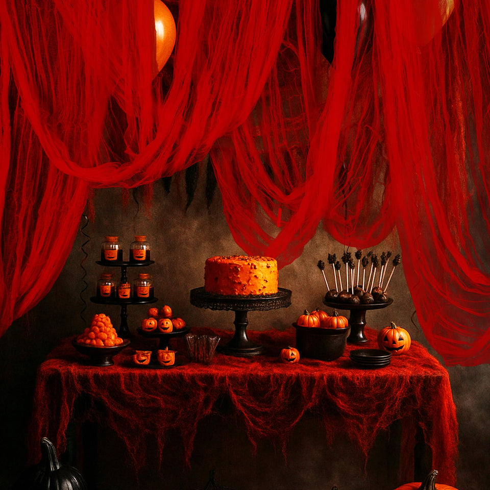 RunNico blood red gauze drapes create a dramatic porch backdrop for Halloween