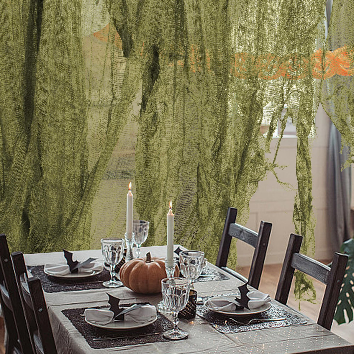 RunNico green cheesecloth drape fluttering in the breeze.