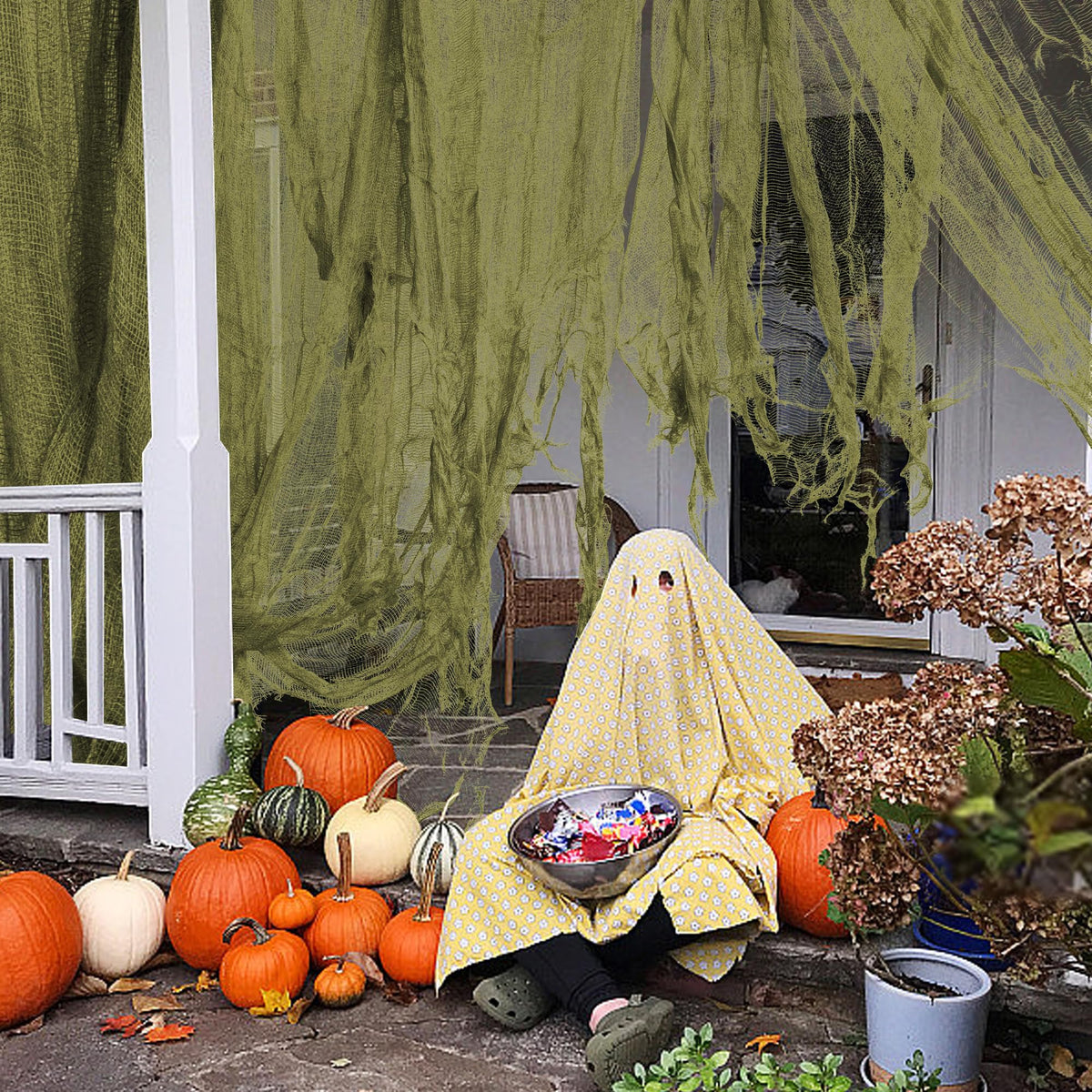 RunNico green horror fabric draped on porch for dramatic effect.