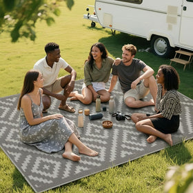 RURALITY 8x10 outdoor rug suited for indoor and outdoor spaces.