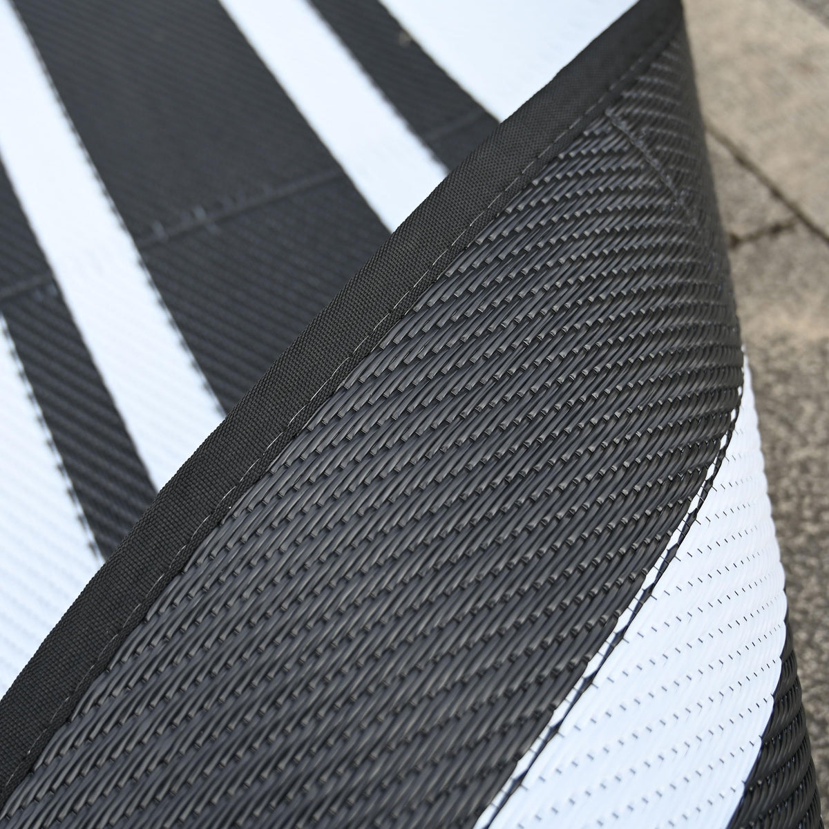RURALITY lightweight rug rolls up for camping or travel