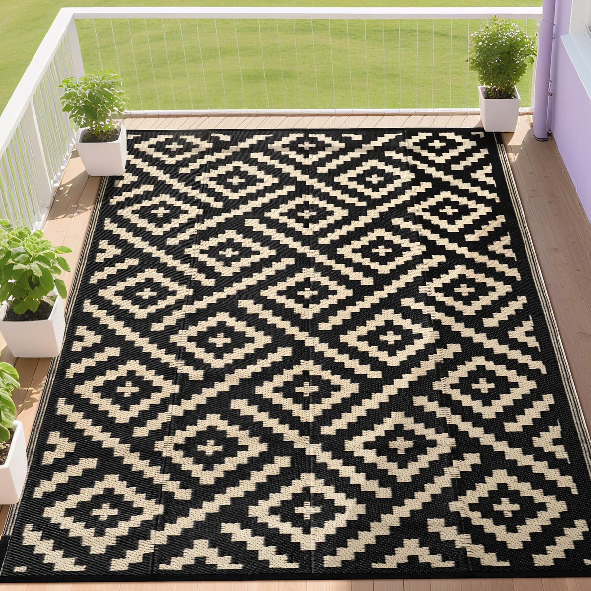 RURALITY outdoor rug 9x12 on patio demonstrates waterproof durability and UV resistance.