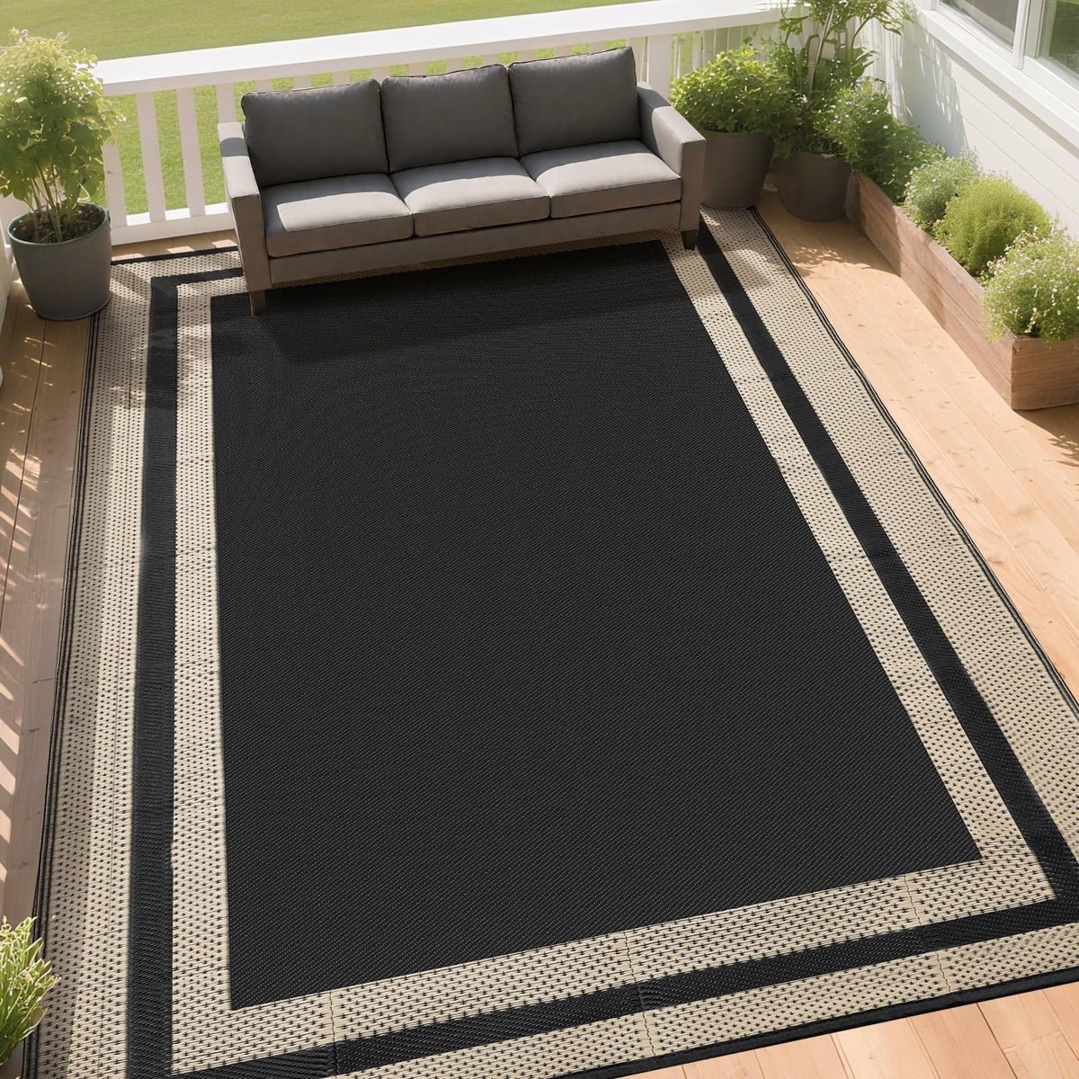 RURALITY rug features fixed corner rings to prevent movement on decks