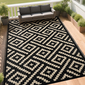 RURALITY reversible outdoor rug on porch shows two looks and stays sturdy in sun.