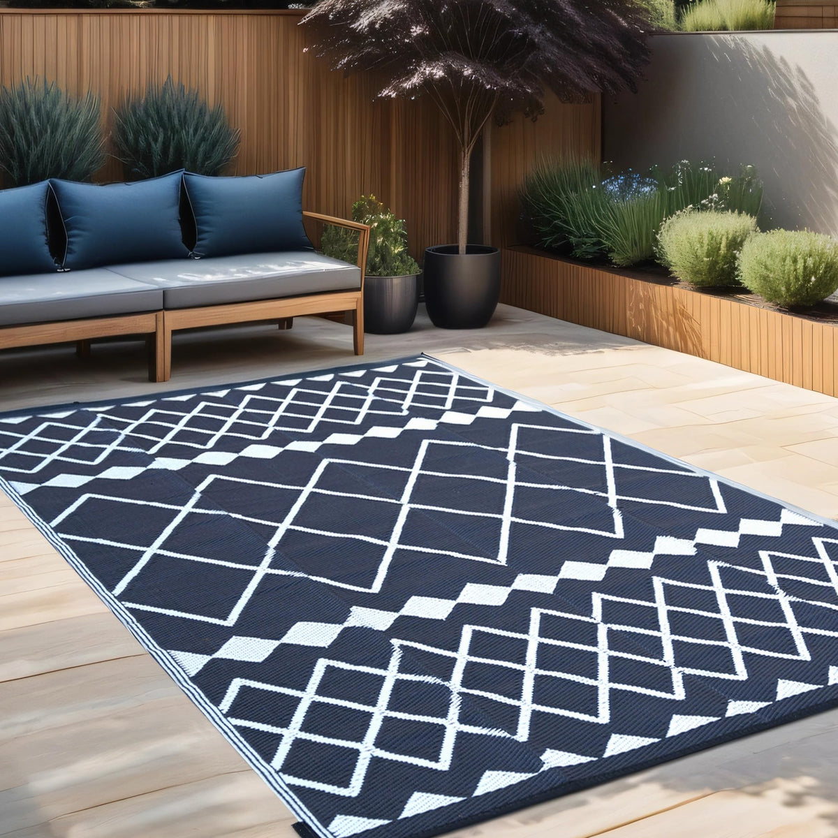 RURALITY outdoor rug UV-resistant weave protects colors in sun.