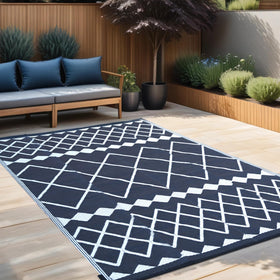 RURALITY outdoor rug UV-resistant weave protects colors in sun.