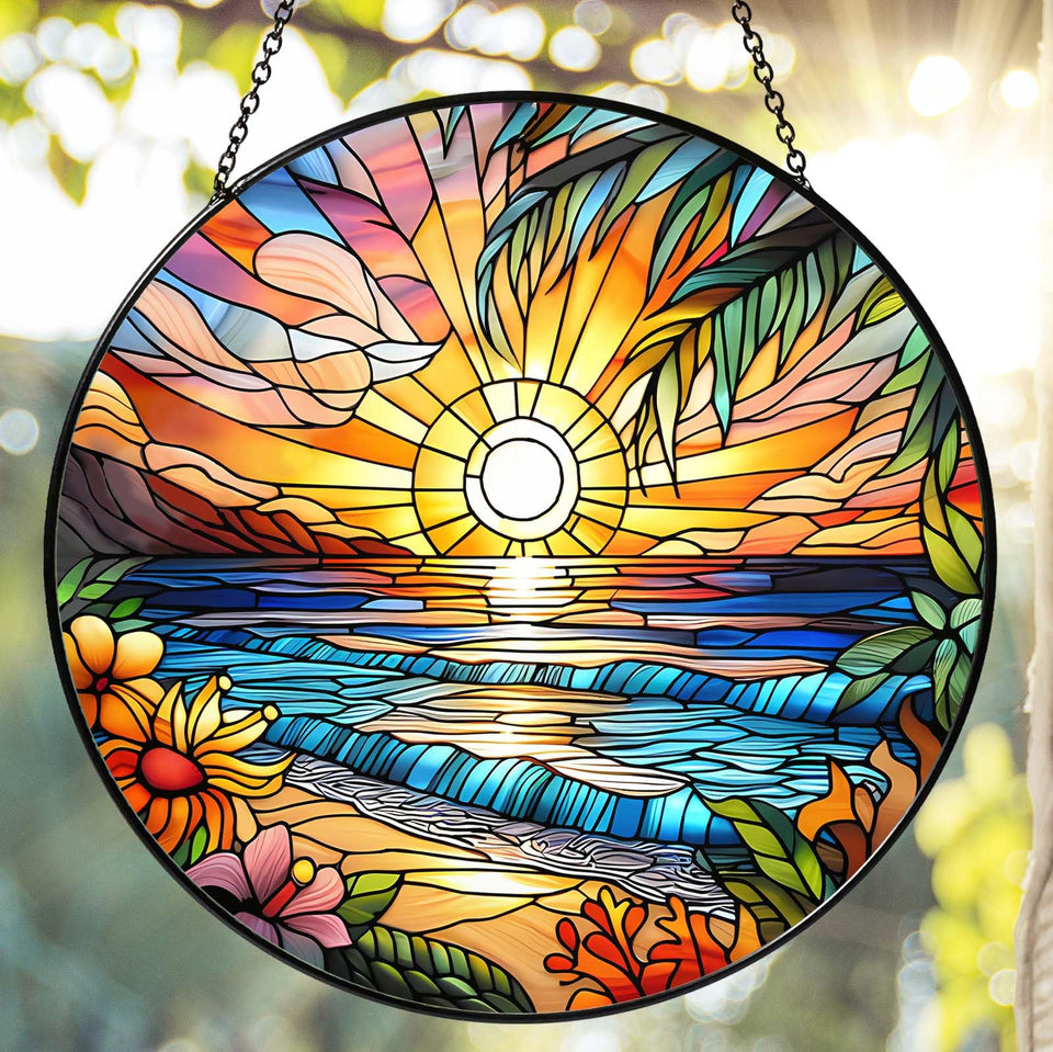 RVEAFA Beach Sunset sun catcher hanging in a window, creating warm color reflections.