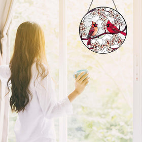 RVEAFA Cardinal Sun Catcher hanging in window refracts sunlight into color