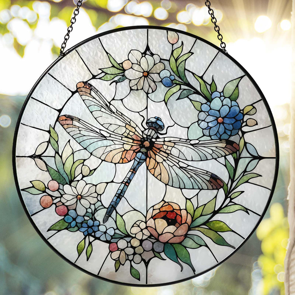 RVEAFA dragonfly suncatcher in window reflecting sunlight into vivid rainbow colors