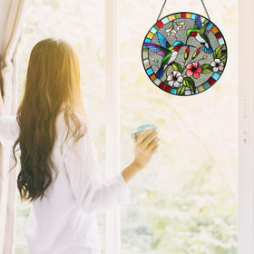 RVEAFA hummingbird hand-painted suncatcher shows craft and glass texture.