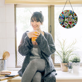 RVEAFA hummingbird sun catcher provides privacy when curtains are absent.