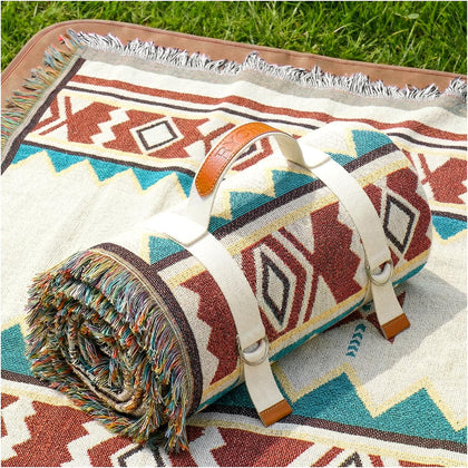 RYCHIC 2-in-1 outdoor picnic mat with soft-woven top for comfortable grass lounging.