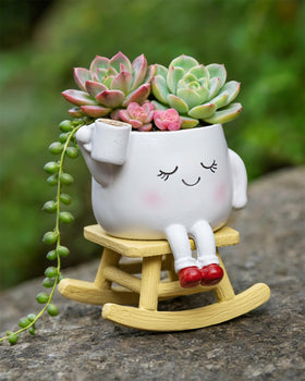 RZOIKZOI rocking chair planter with smiley face adds whimsical charm to spaces