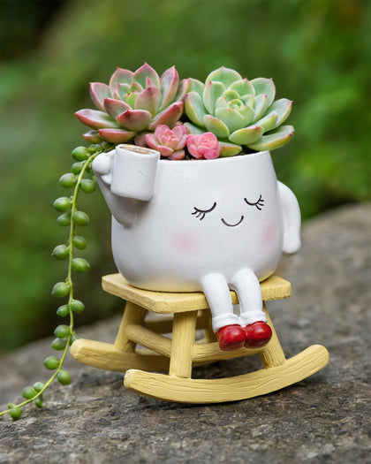 RZOIKZOI rocking chair planter with smiley face adds whimsical charm to spaces