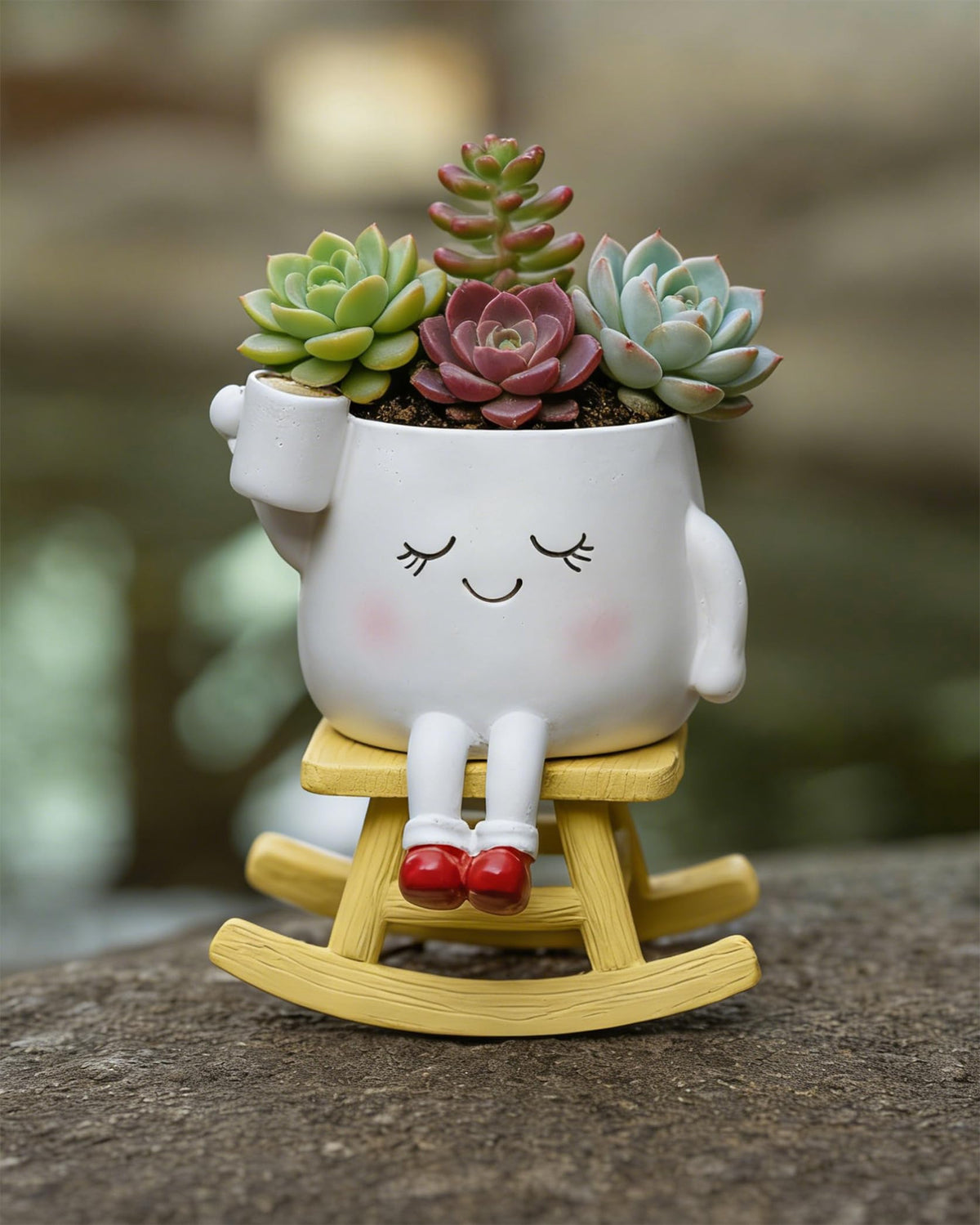 Close-up of the RZOIKZOI smiley planter showing playful character and durability