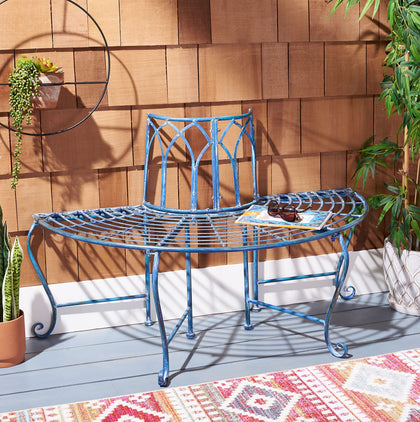 SAFAVIEH Abia iron tree bench with mossy blue scrollwork for shaded seating.