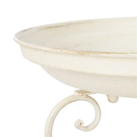 SAFAVIEH bird bath basin welcomes visiting birds with water.