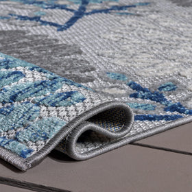 Safavieh Cabana rug laid out on a patio as part of a stylish outdoor setup.
