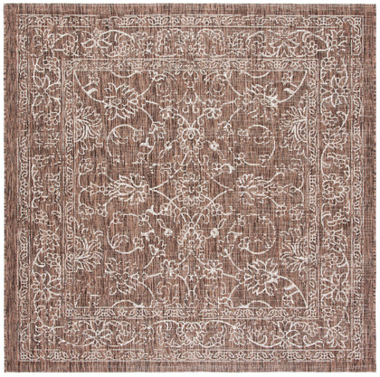 SAFAVIEH Courtyard outdoor rug in brown and ivory, perfect for patios and decks.