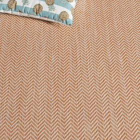 Safavieh easy-clean rug; rinse with hose and air dry.